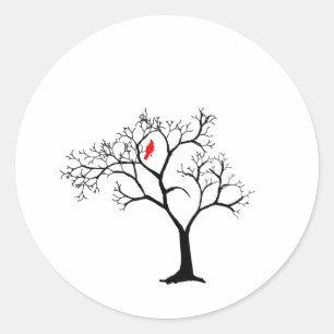 Sticker Rond Oiseau rouge cardinal dans un arbre d'hiver neigeu