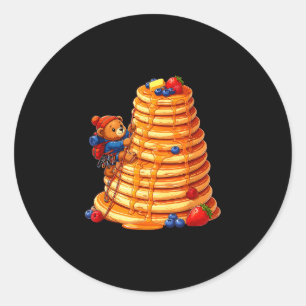 Sticker Rond Ours grimpeur sur pile de crêpes géantes petit-déj