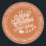 Sticker Rond Papier à lettres Noël Vintage Orange Brûlé Adresse<br><div class="desc">Autocollant d'adresse de retour de Noël rond famille avec votre nom et adresse en typographie élégante avec une jolie image dessinée à la main vintage Joyeux Noël et Bonne Année sur un fond orange brûlé. Ajoutez simplement votre nom et adresse. Conçu exclusivement pour vous par Happy Dolphin Studio. Si vous...</div>