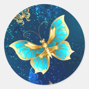 Sticker Rond Papillons dorés sur fond bleu