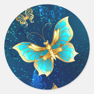 Sticker Rond Papillons dorés sur fond bleu