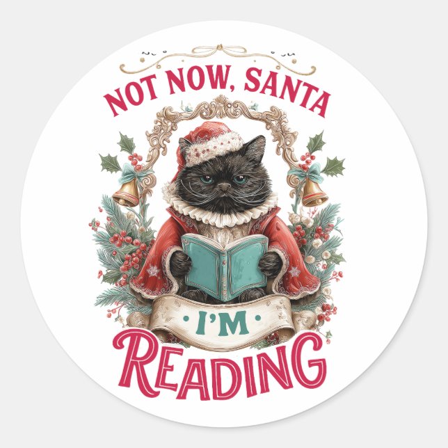 Sticker Rond Pas maintenant le Père Noël, je lis  (Devant)