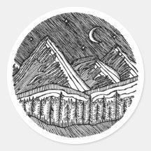 Paysage alpin rond dessiné à l'encre noire et blan