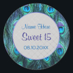 Sticker Rond Peacock Feather Drama ver 2 -Sweet 15<br><div class="desc">Élégante version moderne Peacock en bleu et violet aqua dramatique. Le texte indique Sweet 15,  avec le nom et l'information de date prêt à être customisé par vous. Ceci est la version 2 de 2 avec centre argent.</div>
