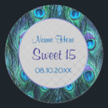Sticker Rond Peacock Feather Drama ver 2 -Sweet 15<br><div class="desc">Élégante version moderne Peacock en bleu et violet aqua dramatique. Le texte indique Sweet 15,  avec le nom et l'information de date prêt à être customisé par vous. Ceci est la version 2 de 2 avec centre argent.</div>