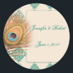 Sticker Rond Peacock Feather sur Teal Marocain Enveloppe Seal<br><div class="desc">Ce magnifique et élégant design appelé Peacock Feather sur Turquoise marocain Carrelage Mariage, dispose d'une plume paon en or contre un arrière - plan crème. Le cadre de cet ensemble est un motif composé de tuiles triangles marocaines turquoises. Les tuiles sont faites avec un motif de défilement.Cet ensemble a des...</div>