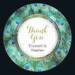 Sticker Rond Peacock Feathers Exotic Wild Aquarelle Merci<br><div class="desc">Un autocollant de remerciement pour les fêtes, mariages, appréciation etc... Avec un motif aux couleurs vives de plumes de paon exotiques et sauvages dans un joli turquoise, vert bijou, aqua et bleu cobalt. Le centre a un cercle doré avec merci écrit en or et vos noms personnalisés. Artistique et fantaisie,...</div>