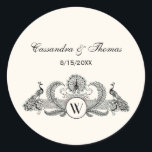 Sticker Rond Peacocks vintages Monogram Ivory BG<br><div class="desc">Peacocks vintages avec Monogramme - Couleur Arrière - plan ivoire Invitations personnalisables et accessoires avec une image stylisée vintage d'un Peacocks avec Monogramme. Vous pouvez facilement modifier ces produits en ajoutant des champs de texte, en supprimant des champs de texte existants, en modifiant des images de conception ou en ajoutant...</div>