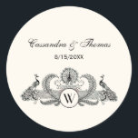 Sticker Rond Peacocks vintages Monogram Ivory BG<br><div class="desc">Peacocks vintages avec Monogramme - Couleur Arrière - plan ivoire Invitations personnalisables et accessoires avec une image stylisée vintage d'un Peacocks avec Monogramme. Vous pouvez facilement modifier ces produits en ajoutant des champs de texte, en supprimant des champs de texte existants, en modifiant des images de conception ou en ajoutant...</div>