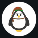 Sticker Rond Penguin de Christmas<br><div class="desc">Ce dessin est l'illustration d'un mignon manchot portant un casquette de Noël. Nous avons d'autres grandes oeuvres d'art disponibles sur de nombreux produits. Toutes nos créations sont des oeuvres originales créées par Angela Allwine. Toutes les oeuvres sont protégées par le droit d'auteur d'Angela Allwine et Mydeas. Nos images ne peuvent...</div>