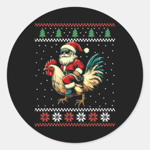 Sticker Rond Père Noël à cheval sur un poulet pull de Noël moch