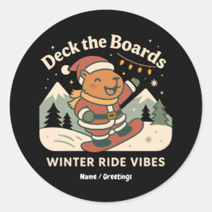 Sticker Rond Père Noël capybara mignon faisant du snowboard sur