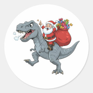 Sticker Rond Père Noël drôle chevauchant un dinosaure T-Rex pou