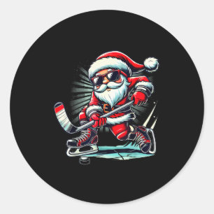 Sticker Rond Père Noël drôle jouant aux amateurs de hockey sur