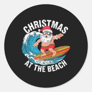 Sticker Rond Père Noël drôle surfant Noël en juillet Xmas été