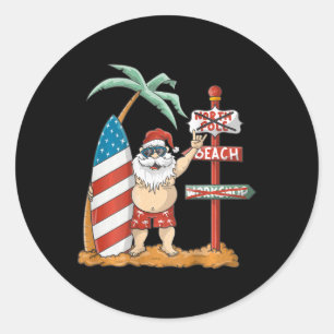 Sticker Rond Père Noël en surf avec planche de surf patriotique