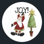 Sticker Rond Père Noël Joy Christmas Holiday<br><div class="desc">Nos T-shirts de vacances Père Noël Joy,  sweatshirts,  tasses,  cartes de voeux et autres articles sont colorés et oh tellement mignon ! Elles comprennent un Père Noël habillé d'un costume pas si traditionnel,  un sapin de Noël avec une étoile d'or,  et un texte qui dit "Joie".</div>