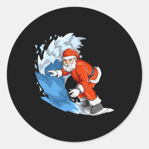 Sticker Rond Père Noël surfant Noël en juillet Père Noël Hawaïe