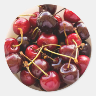Sticker Rond Photographie de Cerises Rouges Fraîches dans un Bo