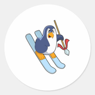 Sticker Rond Pingouin comme skieur avec ski
