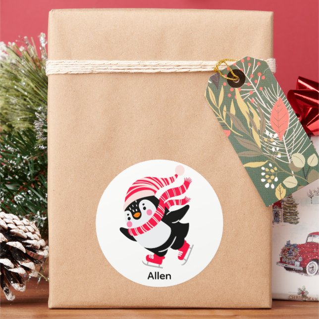 Sticker Rond Pingouin de Noël dans un Casquette et écharpe sur  (vacances)