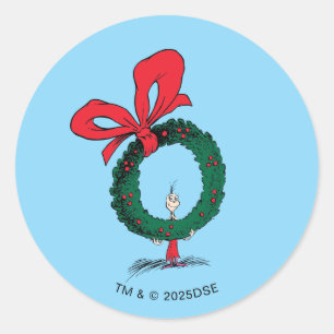 Sticker Rond Qui regarde à travers la couronne de Noël