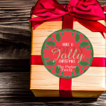 Sticker Rond Red Green A Holly Jolly Christmas<br><div class="desc">Un autocollant Festive personnalisé de Noël avec un cadre vert ovale dessiné à la main et le texte "Ayez un Noël Holly Jolly" avec votre nom dessus. Le texte est entièrement personnalisable. Pour le modifier, utilisez l'option Personnaliser. Pour d'autres modifications, telles que les modifications apportées à la police, à la...</div>