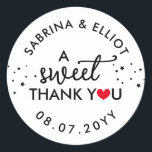 Sticker Rond Red Heart A Sweet Thank You Wedding Favor<br><div class="desc">A sweet thank you wedding favor sticker with a red heart replacing the O in you with your names in curved text along with your wedding date in black fonts against a white background.</div>