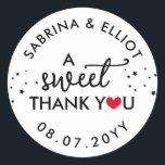 Sticker Rond Red Heart A Sweet Thank You Wedding Favor<br><div class="desc">A sweet thank you wedding favor sticker with a red heart replacing the O in you with your names in curved text along with your wedding date in black fonts against a white background.</div>