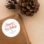Sticker Rond Red Script Happy Howlidays Pet Christmas<br><div class="desc">Répandez la joie des vacances avec notre Sticker. Avec "Happy Howlidays" en écriture manuscrite rouge festive,  accompagnée d'étoiles et de points,  c'est un ajout polyvalent aux cadeaux et aux cartes. Personnalisez-le avec votre nom de famille dans une élégante typographie minimaliste.</div>