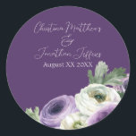 Sticker Rond Romantic Watercolor Ranunculus on Dark Purple<br><div class="desc">Ces étiquettes d'autocollants floraux romantiques ont un élégant arrière - plan violet foncé avec des fleurs de ranunculus blanc et violet aquarelle. Un délicat bouquet de ranunculus et de verdure est représenté en bas à droite. Les noms d'échantillons d'un couple marié et la date du mariage sont imprimés dans la...</div>