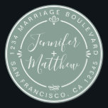 Sticker Rond Rustic Chic Mariage Retour Adresse Dusty Green<br><div class="desc">Chic, moderne et simple mariage fait maison autocollant d'adresse de retour avec vos noms et adresse en blanc élégante calligraphie manuscrite et typographie stylisée sur un arrière - plan vert poussiéreux, agrémenté de lauriers et autres détails décoratifs rustiques. Ajoutez simplement votre nom et votre adresse de monogramme conçus exclusivement pour...</div>