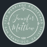 Sticker Rond Rustic Chic Mariage Retour Adresse Dusty Green<br><div class="desc">Chic, moderne et simple mariage fait maison autocollant d'adresse de retour avec vos noms et adresse en blanc élégante calligraphie manuscrite et typographie stylisée sur un arrière - plan vert poussiéreux, agrémenté de lauriers et autres détails décoratifs rustiques. Ajoutez simplement votre nom et votre adresse de monogramme conçus exclusivement pour...</div>