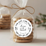 Sticker Rond Rustique Floral Wreath Love is Sweet Wedding Favor<br><div class="desc">Des autocollants et des étiquettes de mariage conçus sur mesure et dotés d'une couronne fleurie rustique "Love is Sweet",  de noms de couple et de date personnalisés.</div>