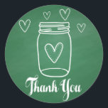 Sticker Rond Rustique Mason Jar Merci Green Chalkboard<br><div class="desc">Faites plaisir à vos amis et à votre famille avec ces stickers charmants en Merci en bocal. Cet autocollant rustique présente un pot en maçon blanc dessiné à la main avec des coeurs blancs et un message de remerciement imprimé dans une police en caractères gras surligné contre un arrière -...</div>