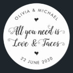 Sticker Rond Rustique Tout ce dont vous avez besoin est Love Ta<br><div class="desc">Un Sticker Mariage classique en Merci noir avec "All You Need is Love and Tacos" dans une calligraphie de police moderne et rustique. Vous pouvez facilement le personnaliser avec vos noms et date mariage.</div>