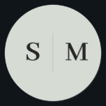 Sticker Rond Sage Green Monogramme Mariage élégant<br><div class="desc">Ajoutez une touche d’élégance aux détails de votre mariage avec cet autocollant personnalisé avec le monogramme du couple au centre, créant un point focal raffiné. Le texte est magnifiquement rendu dans une police serif élégante, offrant un design intemporel et sophistiqué. Idéal pour sceller des invitations de mariage, des faveurs ou...</div>