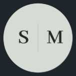 Sticker Rond Sage Green Monogramme Mariage élégant<br><div class="desc">Ajoutez une touche d’élégance aux détails de votre mariage avec cet autocollant personnalisé avec le monogramme du couple au centre, créant un point focal raffiné. Le texte est magnifiquement rendu dans une police serif élégante, offrant un design intemporel et sophistiqué. Idéal pour sceller des invitations de mariage, des faveurs ou...</div>
