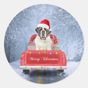 Sticker Rond Saint Bernard Dog en Neige assis Camion de Noël
