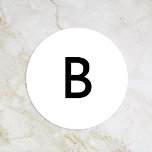 Sticker Rond Sceau de l'enveloppe Mariage de monogramme moderne<br><div class="desc">Présentant notre design de sceau d'enveloppe Mariage Monogramme moderne blanc, une véritable représentation du minimalisme moderne et de l'élégance. Avec son mélange unique d'éléments créatifs et de design chic, ce design est parfait pour ceux qui recherchent une esthétique polie et audacieuse lors de leur journée spéciale. Notre élégante typographie décalée...</div>