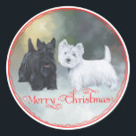 Sticker Rond Scottie Westie Christmas<br><div class="desc">Venez visiter notre magasin Maggie Ross Scotties pour voir tous les modèles montrant Scottish Terriers et West Highland White Terriers ensemble dans des décors saisonniers. Maggie et Ross étaient les noms de nos chiens Westie et Scotty et ils vivent dans mon oeuvre d'art. Choisissez notre outil de texte facile pour...</div>