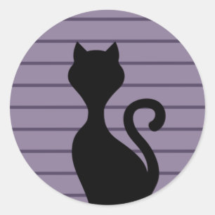 Sticker Rond Silhouette de chat noir en arrière - plan violet