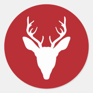 Sticker Rond Silhouette de tête de cerf blanc sur fond rouge