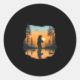 Sticker Rond Silhouette d'ours masculin dans la nature avec dég