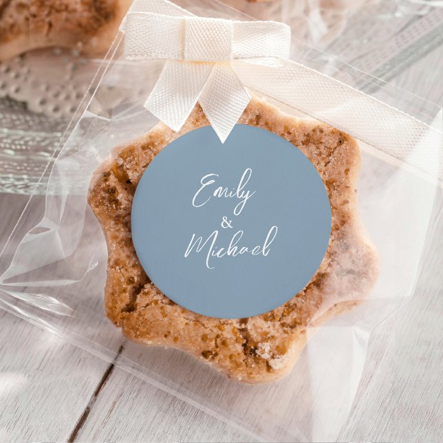 Sticker Rond Simple Elegant Dusty Blue Script Minimal Wedding (Simple and elegant, minimal white calligraphy script on a dusty blue background)