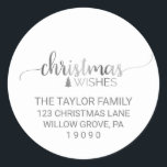 Sticker Rond Simple Silver Calligraphy Christmas Adresse de ret<br><div class="desc">Ces autocollants d'adresse de retour de noël de calligraphie argent simple sont parfaits pour une carte de vacances chic ou une enveloppe d'invitation. L'élégant design comprend une police de caractères de brosse en faux argent de luxe qui dit "voeux de Noël" et un petit arbre de Noël. Veuillez me contacter...</div>