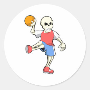 Sticker Rond Skeleton at Handball player avec Handball