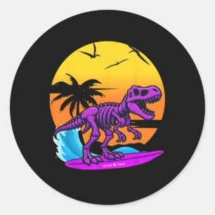 Sticker Rond Squelette de T-rex surfant au néon avec rétro plag