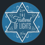 Sticker Rond Star of David Festival of Lights Blue Hanoukka<br><div class="desc">Une grande étoile bleu cobalt de David est la pièce centrale de cette impression autocollante contre un arrière - plan bleu plus clair. Les mots "Le Festival des Lumières" s'impriment à l'intérieur de l'étoile avec des tourbillons à l'intérieur et rayonnant à l'extérieur de l'étoile pour faire une belle faveur Hanoukka....</div>