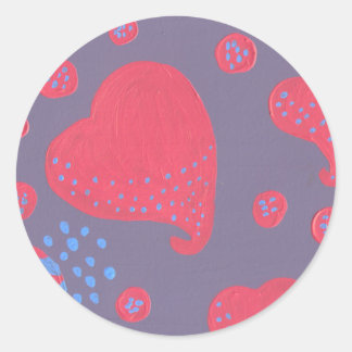 Sticker Rond sucette attaquée par des coeurs
